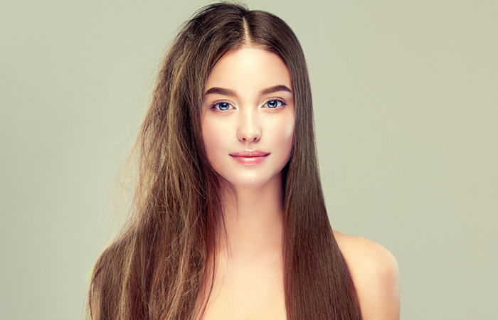 Woman showing before and after effects of a keratin treatment