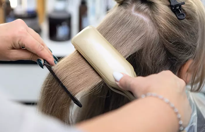 Woman Getting A Keratin Treatment Done In A Salon