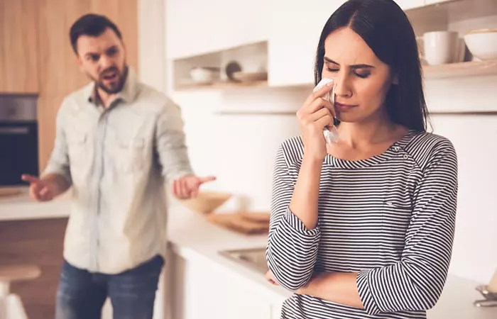 Woman crying after a fight with her boyfriend