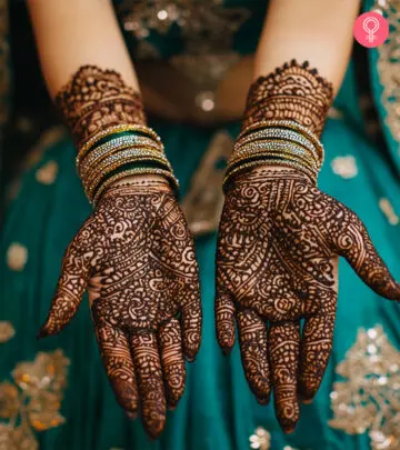 Woman With Mehendi On Her Hands