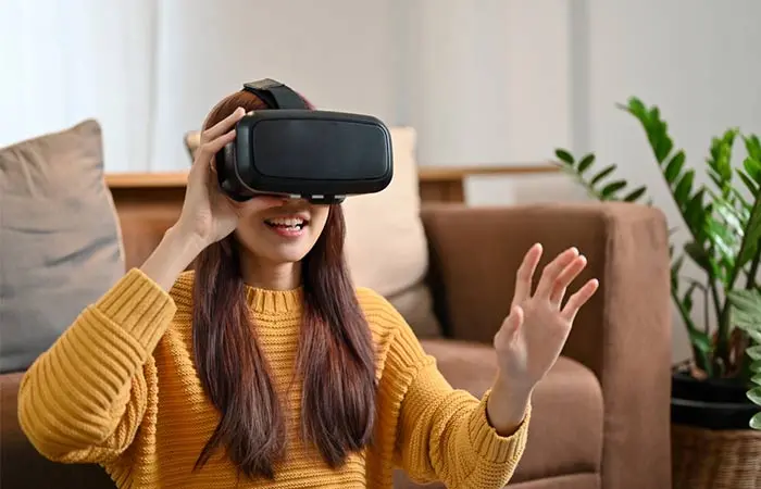 Teenager playing a VR game