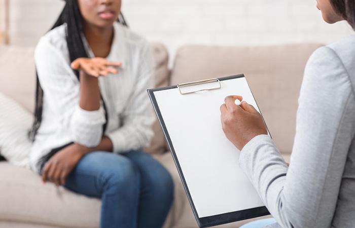 Woman seeking therapy to deal with her lying spouse