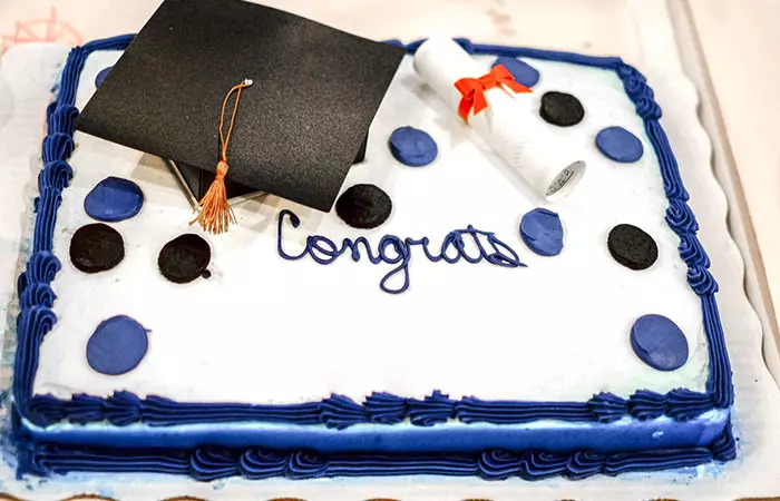 Blue And White Cake With Graduation Cap