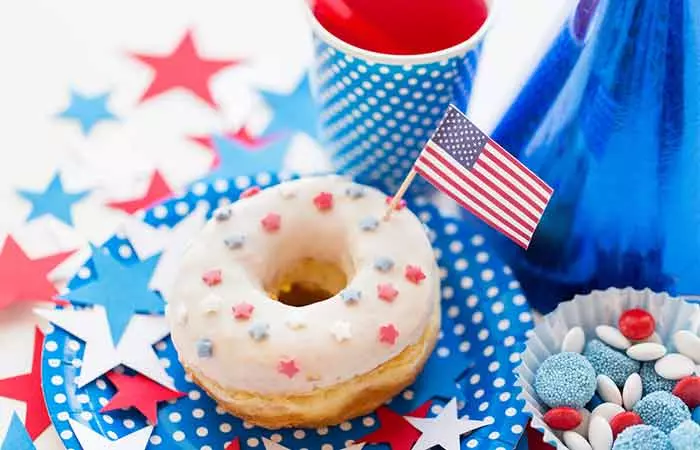 Glazed Sweet Donut With Juice And Candies