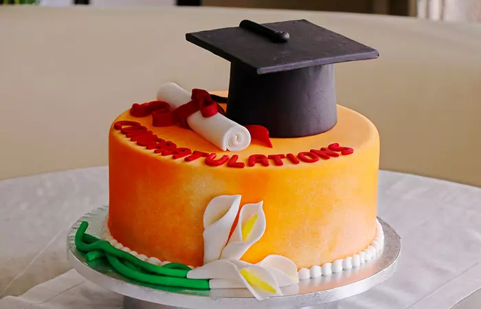Orange-Icing-And-Vanilla-Flavored-Cake-With-Graduation-Cap