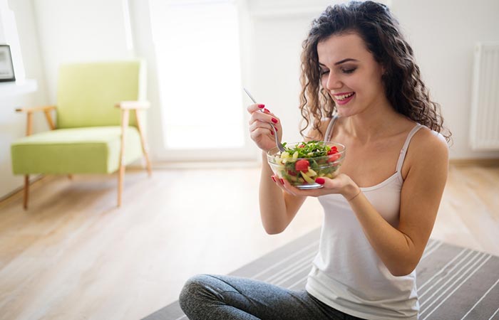Woman consumes healthy diet to prevent hair thinning.