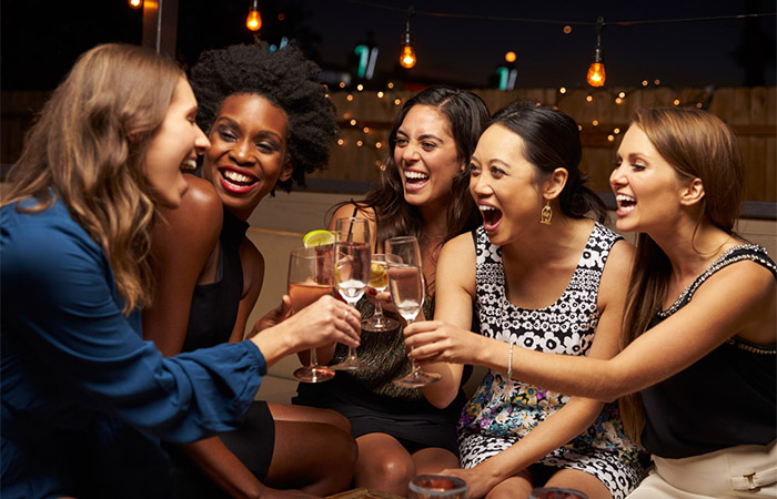 Girls enjoying a girls night out without their men to make them jealous