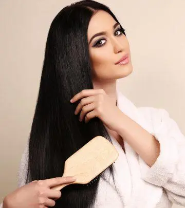 Woman brushing her long hair