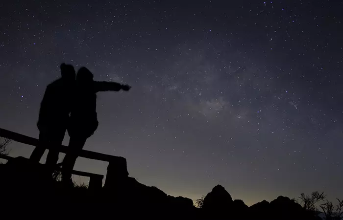 Couple star-gazing together