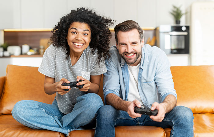 Couple playing video game together