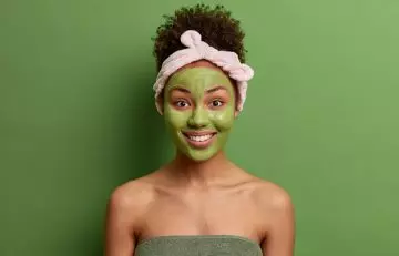 Woman with chlorophyll face mask