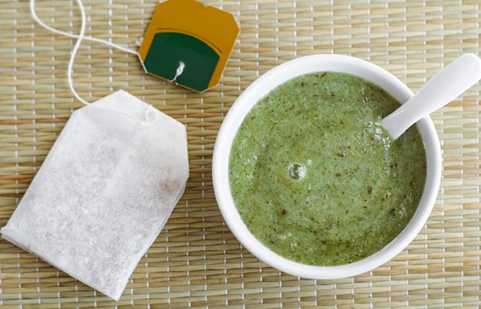 Shot of green tea bag and bowl filled with green tea paste