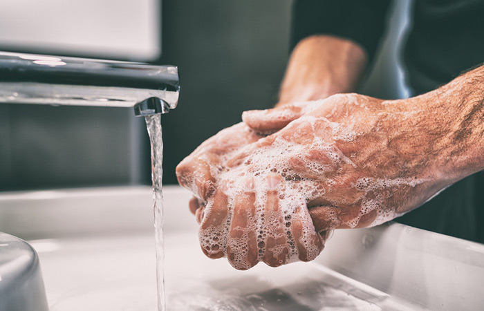 Man washing his hands 