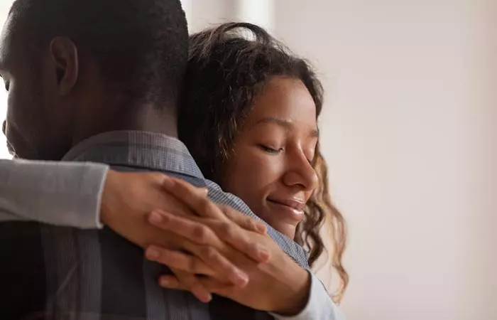 A couple hugging each other tightly after a honest discussion.