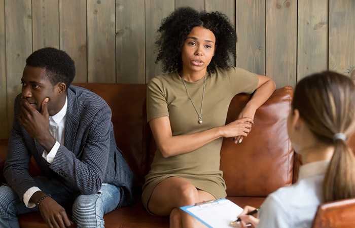 Couple taking counseling session to deal with anger issues