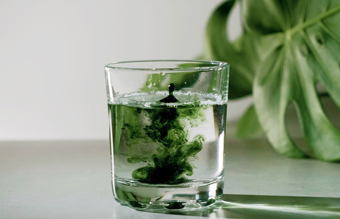 Chlorophyll mixed in a glass of water
