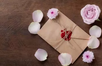 Seal the love letter envelope for a surprise