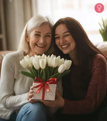 A girl giving birthday wishes to an older woman