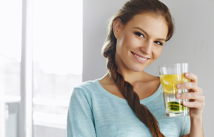 Woman following the clear liquid diet .