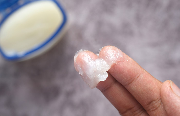 Petroleum jelly can get nail glue off the skin
