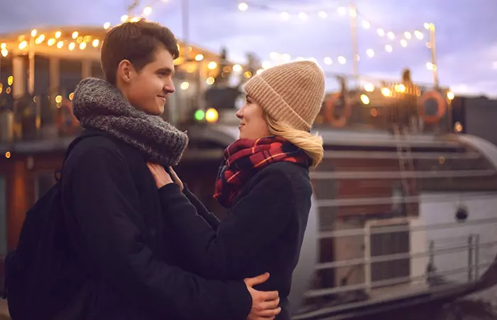 A man and woman happily looking into each other's eyes 