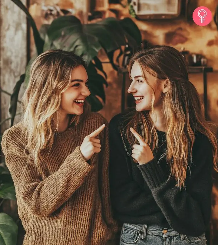 Two sisters in a yellow hoodie