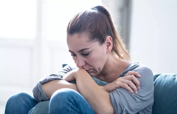 Woman depressed due to a toxic relationship