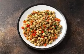 A bowl of quinoa salad with chickpeas