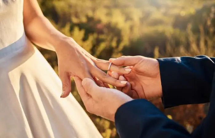 A couple with engagement rings