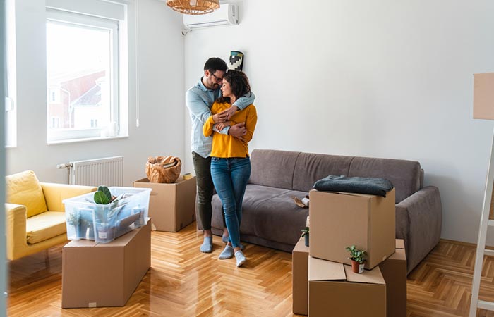 Loving couple moving in