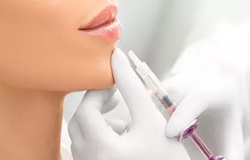 Opt for dermal fillers to make your lips look bigger