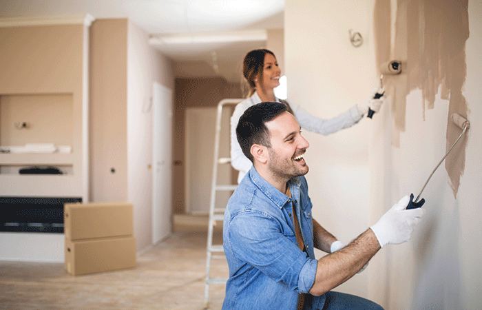 Painting a room is one of the things for couples to do at home