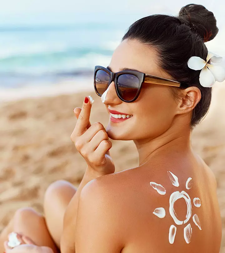 A woman choosing sunscreen