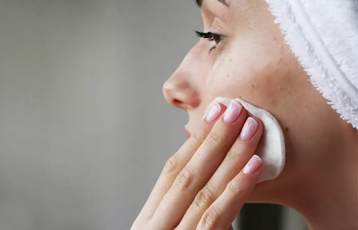 Woman cleaning the scabs to prevent further infection