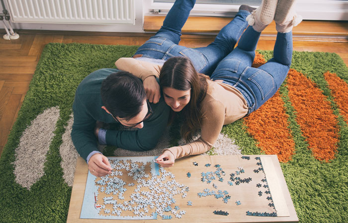 Solving puzzles is one of the things for couple to do at home
