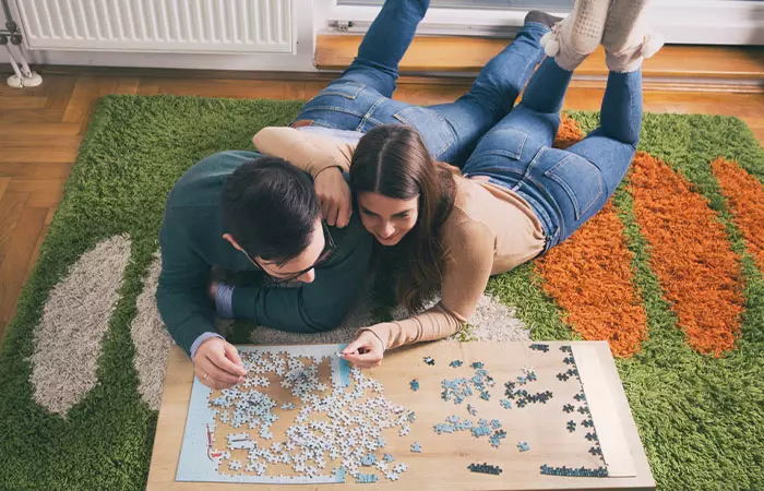 Solving puzzles is one of the things for couple to do at home