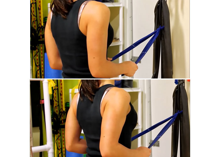 Standing rows shoulder impingement exercise to reduce pain