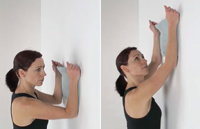 Wall slides shoulder impingement exercise