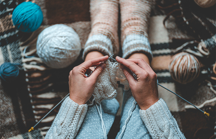learning to knit is one of the things for couples to do at home