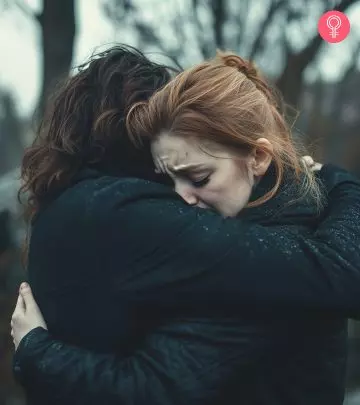 A guy giving condolence to his friend