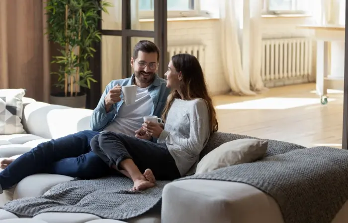 A cute couple talking over coffee