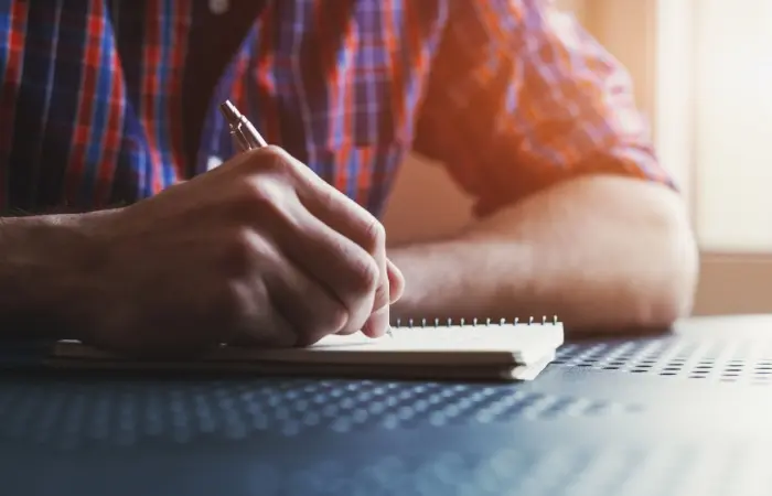 A woman writing a letter