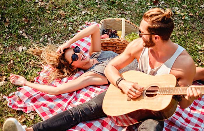 Couple enjoying a romantic picnic.