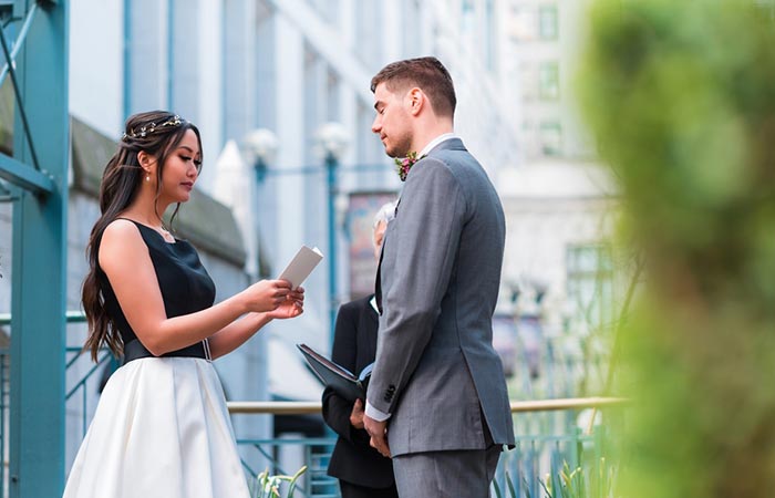 Bride reading romantic wedding vows