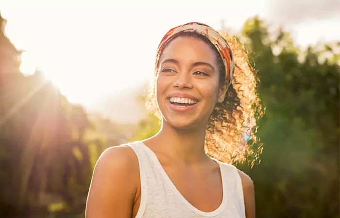 Woman eating juniper berries protects skin from sunrays