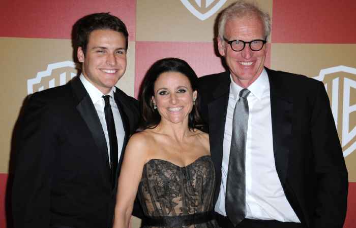 Julia Louis-Dreyfus and Brad Hall with their son