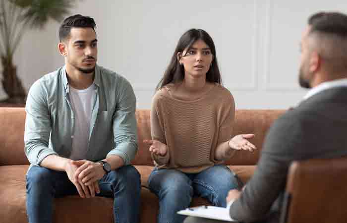 Man seeking professional help with girlfriend by attending couples' counseling to deal with toxic girlfriend