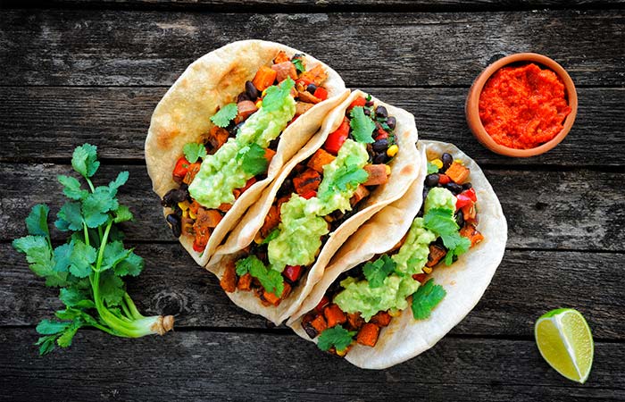 Black beans tacos with sweet potato and avocado