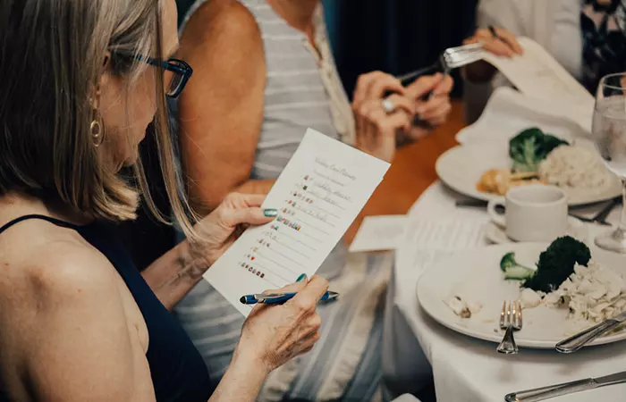 Guests filling out 'Whose Memory?' questionnaire