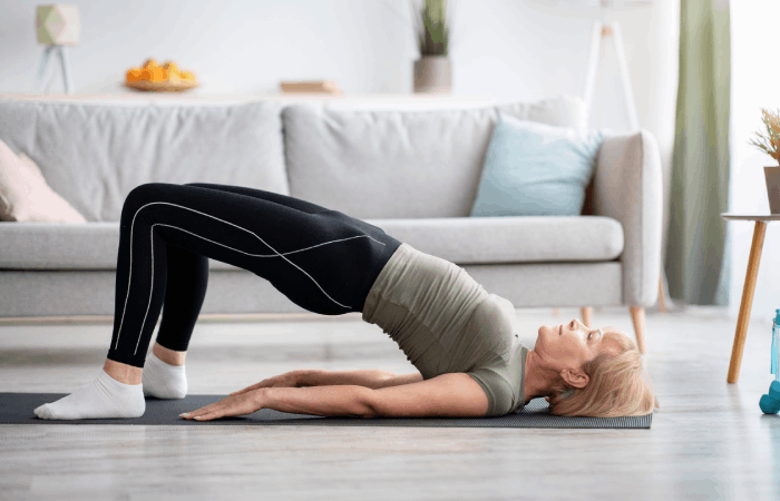 Woman practicing bridges exercise